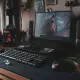 a laptop sits on top of a desk